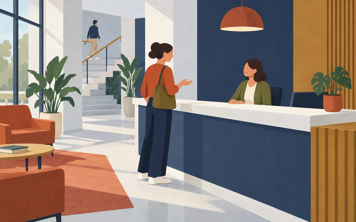 A visitor politely asking a secretary for help at a French training-centre reception, plain folders and computer screen hidden.